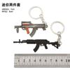 Arma devoradora de pollos periférica mini MK14awm 98K Glock sks rueda izquierda m416 juguete llavero traje