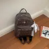 Bolsa de Costas Dupla com Laço de Bolinhas Transfronteiriça Feminina Pequena Nova Moda Verão 2026 Versátil Diária Compras na Rua Mochila Pequena