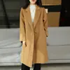 Otoño e invierno traje minimalista para mujer cuello solapa holgado abrigo de lana de doble cara moda cálido abrigo largo de lana venta al por mayor