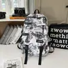 Mochila para niños, estudiantes de secundaria y preparatoria, estilo callejero americano, diseño de graffiti moderno, alta calidad, adecuada para viajes, también disponible para niñas