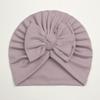 Otoño e invierno europeo y americano nuevo terciopelo alemán para niños gorro suave con lazo para bebé cálido gorro de punto liso sombrero para bebé