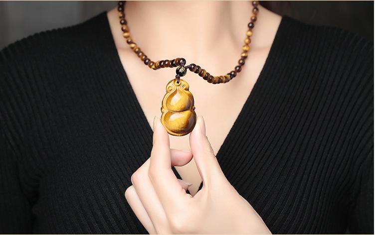 智贝详情图_7厂家金黄色虎眼石如意钱袋子吊坠男女款玉石知足常