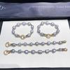 Moda tainan alienígena Barroco perla de agua dulce collar pulsera temperamento traje gris origen una generación de cabello