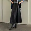 Falda midi de piel para mujer para otoño e invierno, de cintura alta, falda larga con bolsillos, que cubre la cadera y efecto adelgazante
