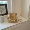 Bolso tipo cubo de alta apariencia 2026 Verano Nuevo de Moda Bolso Cruzado de Cadena Nicho Estilo Relajado Bolso de Mano de Color Sólido