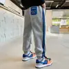 Z770 Yang Temprano Niños Primavera 2024 Nuevo Tendencia de Moda Deportiva Color Brillante Cinta de Letras Pantalones de Pierna