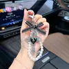Llavero Retro Corazón Cruzado Desgastado Cadena de Perlas Colgante de Lazo Encanto Dulce Fresco para Bolso Subcultura para Mujeres