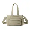 2026 Nova Tendência Fashion Versátil Grande Capacidade Feminina Casual Leve Bolsa de Nylon Bolsa para Viagem Curta Bolsa Almofada
