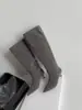 Elegantes botas largas grises adelgazantes para mujer, nueva colección otoño/invierno 2025, punta fina, tacón de aguja, diseño simple, estilo de pierna recta