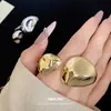 Anillo Abierto Irregular Circular Plegado Estilo Europeo y Americano 2026 Diseño de Nicho Anillo para Viajar Lujo Ligero Joyería de Alta Gama