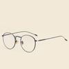 Nuevas gafas de metal retro con montura redonda unisex, con espejo liso y tendencia artística.
