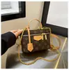 Bolso tipo cubo de hombro para mujer con estampado de flores vintage de alta gama, nuevo modelo de moda 2025, bolso pequeño cruzado versátil