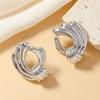 Estilo punk retro metálico europeo y americano C-shaped twist twist shell perla liso personalidad pendientes roscados pendientes