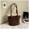 Bolsa de Hombro Única Más Vendida Bolso de Mujer Bolso Cubo Bolso de Pan de Terciopelo Nuevo de Moda Sensación de Alta Gama Bolso Cruzado Bolso de Mano al por Mayor