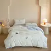 2026 Nuevo Conjunto de Cuatro Piezas Estilo Bordado de Felpa de Leche de 230g Conjunto de Tres Piezas Estilo Sábana de Cama de 1.2m Ramo de Conejitos
