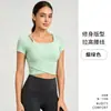 Nuevo estilo de top de yoga asimétrico cruzado con sujetador incorporado, ajuste ceñido, adecuado para Pilates, fitness y entrenamientos, de manga corta, para mujer