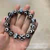 Pulseira de ágata contas do céu Xizang naturais por atacado três olhos Xizang contas do céu antigas estilo étnico retrô pulseira de contas de Buda embrulhadas em seda