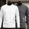 Camiseta masculina de manga longa gola redonda, cor sólida versátil, corte solto, para primavera e outono, top casual moderno