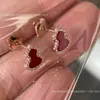 Brincos de alta qualidade, totalmente cravejados de diamantes, de tamanho pequeno para mulheres, apresentando um design de luxo leve, estilo chinês com detalhes em madrepérola, primorosamente trabalhados, delicados e versáteis