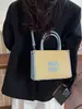 Bolsas Nuevas de Invierno 2026 Transfronterizas Versátil Estampado de Letras Gran Capacidad Texturizado Lujo Ligero Bolso de Hombro Único y de Mano para Mujer