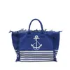 Bolso de lona con letra y borla minimalista para comercio exterior, bolso de mano de gran capacidad, nuevo bolso tote de hombro de color liso para uso transfronterizo
