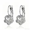Suministro directo transfronterizo aretes de acero inoxidable con incrustaciones de diamantes para mujer, aretes de flor y moño de moda, accesorios para orejas sin perforación, joyería de lujo ligero