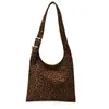 Bolsa Tote Ombro Grande de Camurça Casual para Mulheres 2025 Outono Nova de Alto Padrão Nicho Versátil Bolsa de Braço