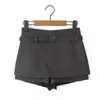 Ins transfronterizo estilo europeo y americano 2026 nueva moda elegante ropa de mujer al por mayor delantal fino a rayas pantalón falda de dos piezas falso