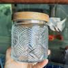 Tarro de dulces con relieve de flor de begonia vintage para el hogar, tapa de bambú, tarro de almacenamiento de bocadillos, tarro de té sellado de vidrio transparente, venta al por mayor