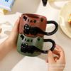 Taza pequeña con diseño de gato negro en relieve, de alto valor cromático, creativa, apilable, de cerámica, para café, leche y desayuno, esmaltada.