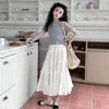 Conjunto Curto de Manga Curta para Meninas Primavera e Outono 2026 Novo Estilo Coreano Moda Saia Conjunto de Duas Peças para Crianças e Crianças Mais Velhas