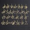 Nuevo colgante de letra de cuerpo de hierba y flor de hip-hop europeo y americano con hebilla de semilla de melón, collar de cadena cubana, joyería con colgante de letra al por mayor