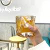 Ins Café Universal Alien Twisted Water Cup Vidro Transparente Produtos Milk Cup Opening Gift Atacado
