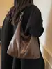 Otoño Retro Nuevo Gran Capacidad 2025 Nuevo Estilo Coreano Moderno Color Sólido Casual Ropa de Trabajo Bolso Tote de Hombro para Mujer