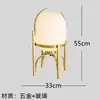 Lámpara de noche minimalista moderna Luz nórdica Lujo de diseño Vidrio artístico Modelo de hotel Habitación Sala de estar Dormitorio Le De Zhu