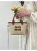 Bolso Tejido para Mujer Moda Coreana y Japonesa Tendencia Bolso de Mano de Paja Nicho 2026 Bolso Tote Hombro Nuevo Cubo Cruzado