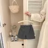 Pantalones Cortos de Lana Vintage para Bebé Otoño 2026 Nuevo Estilo Coreano Cintura Elástica Versátiles de Longitud Media para Niñas