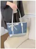 Bolso Grande de Gran Capacidad para Mujer 2026 Nueva Moda Bolso de Hombro para Viajar Sensación de Alta Gama Bolso Tote de Mezclilla