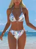 2026 Nuevo Estilo Europeo y Americano Estampado Bikini de Dos Piezas para Mujer con Cuello Halter Triángulo Traje de Baño Vacaciones Playa Sexy Conjunto de Traje de Baño