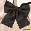 Plaid Negro Estilo Japonés JK Cuello Corbata de Lazo Flor Estilo Universitario Femenino Foto de Graduación Corbata de Lazo Camisa Ins Uniforme de Marinero