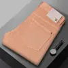 Jeans de alta gama de lujo ligero color amarillo-marrón italianos para hombre, nuevos pantalones ajustados elásticos de moda para otoño e invierno