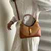 Bolsa feminina de alta qualidade, color-blocking, design de nicho, novo modelo 2025, bolsa de mão versátil para o dia a dia, bolsa de bolinho da moda