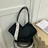 Bolso de mujer de gran capacidad 2026 verano nuevo estilo vintage patrón tejido bandolera para debajo del brazo bolso tote texturizado para el día a día