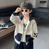 Chaqueta con capucha para niño Primavera y Otoño 2026 Nueva Moda Infantil Fresca de Manga Larga Atuendo de Otoño Top Casual Deportivo para Niño