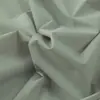 Tejido de spandex elástico verde de secado rápido, protección solar y tacto fresco para ropa de verano transpirable, faldas, mascarillas y chaquetas