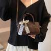 Bolso Cuadrado Pequeño Texturizado para Mujer 2026 Principios de Primavera Nuevo Estilo Coreano Color Sólido Diseño de Nicho Bolso Cruzado para el Trabajo y el Ocio Bolso de Hombro