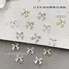 Nuevo producto transfronterizo: Accesorios para decoración de uñas estilo japonés, popular diseño de mariposa con incrustaciones de oro y diamantes, pedrería para uñas ultrabrillante al por mayor