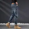 Jeans azul vintage de alta qualidade para homens, corte slim, estilo americano moderno, calça comprida elástica, novo modelo versátil para a primavera de 2026