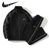 Ropa Deportiva Casual de Hombre Transfronteriza Otoño 2025 Nuevo Traje Deportivo Casual Chaqueta de Hombre Pantalones de Trabajo Conjunto de Dos Piezas para Pareja Mujer