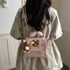 Bolso de mano cuadrado pequeño texturizado transfronterizo de moda para mujer, nuevo bolso de hombro fresco de lunares para el verano 2026, mochila versátil